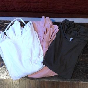 3 Fabletics shirts.